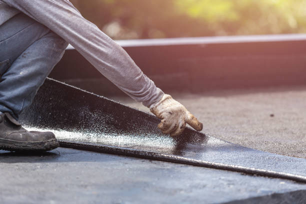 Professional Waterproofing technician working in Centerville, MN